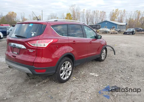 2015 Ford Escape Titanium z USA, uszkodzony, nr VIN 1FMCU9J90FUB74988